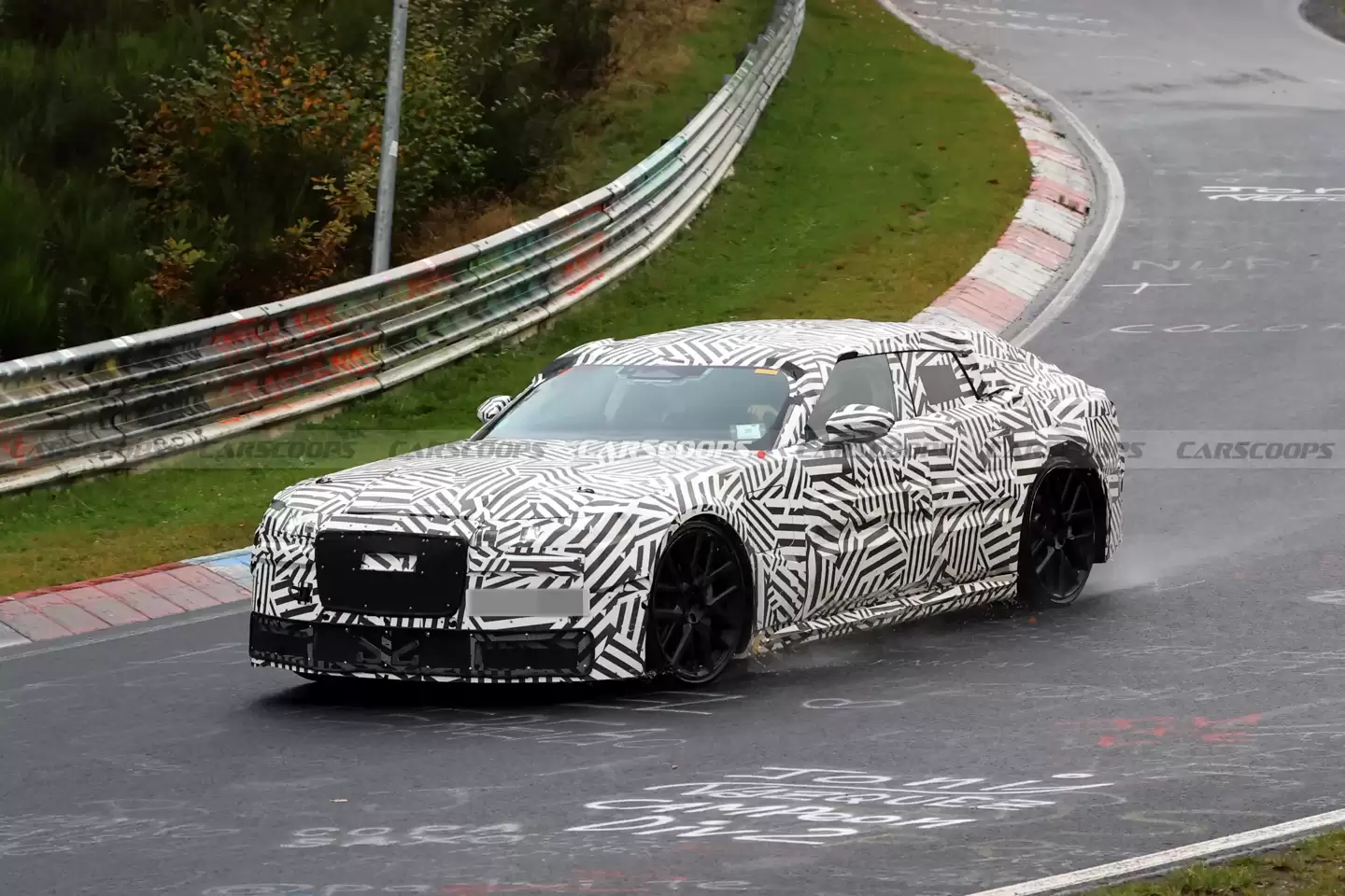 捷豹“品牌重塑之作”Type 00 纯电轿跑谍照曝光，采用大胆无后窗设计