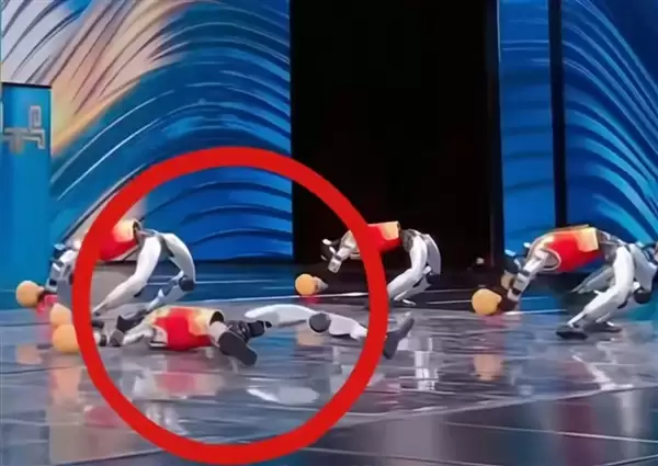春晚宇树机器人摔倒了！王兴兴回应：导演安排的剧情需要