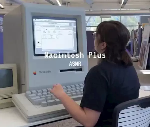 1986年的苹果巨无霸Mac电脑亮相：女孩打字演示 这键盘太狂了