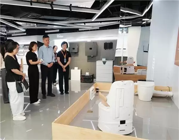 中国残疾人辅助器具中心领导一行莅临拓邦股份,调研科技助残创新成果
